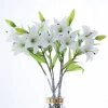 Yiwu wholesale high-fidelity film lilies, 3-head long branches, home, wedding, dining table, hotel decorative flowers, artificial plants, artificial flower arrangements Item Picture